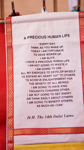 Two pocket decorative wall hanging with His Holiness the Dalai Lama's quote- "Precious Human Life"